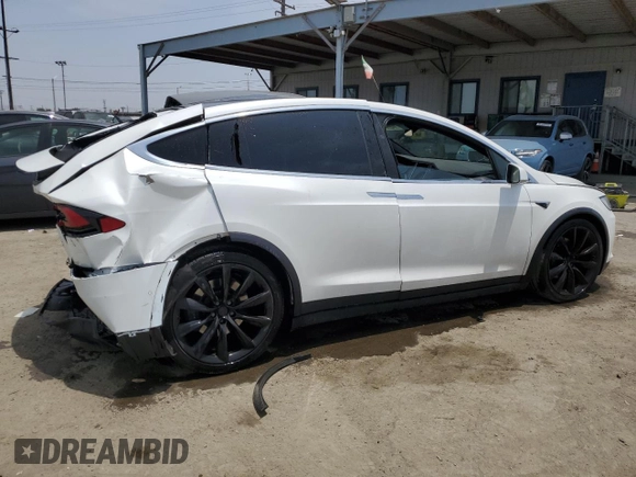 2017 Tesla Model X 90D with VIN 5YJXCAE26HF079421, listed as a Copart auction lot 47889005 with 88,281 mi miles and Salvage Title. Bid and sale history available at DreamBid. Image 3.