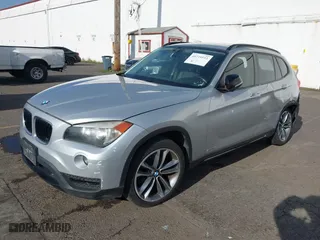 2014 BMW X1 sDrive28i with VIN WBAVM1C58EVW52847, listed as a IAAI auction lot 40779553 with 151,076 mi miles. Bid and sale history available at carsss.com. Image 18.
