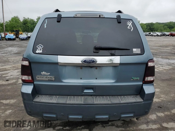 2010 Ford Escape Limited with VIN 1FMCU9EG1AKC75518, listed as a Copart auction lot 61332425 with 90,017 mi miles and Salvage title. Bid and sale history available at DreamBid. Image 6.