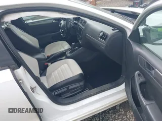 2016 Volkswagen Jetta Sport z VIN 3VWD17AJ3GM216976, wystawiony jako IAAI lot #42012643 z przebiegiem 145 795 mil mil oraz . Historia ofert i sprzedaży dostępna na DreamBid. Obrazek 5.