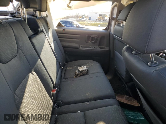 2012 Honda Ridgeline Sport z VIN 5FPYK1F75CB453602, wystawiony jako Copart lot #85459634 z przebiegiem Nie podano mil oraz Szkoda całkowita • Salvage title. Historia ofert i sprzedaży dostępna na DreamBid. Obrazek 10.