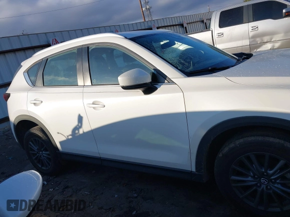2020 Mazda CX-5 Sport with VIN JM3KFABMXL1824574, listed as a IAAI auction lot 41029057 with 47,760 mi miles. Bid and sale history available at carsss.com. Image 13.