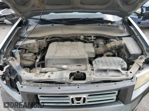 2008 Honda Ridgeline RTL z VIN 2HJYK16528H529507, wystawiony jako Copart lot #60049855 z przebiegiem 173 863 mil mil oraz Szkoda całkowita • Salvage title. Historia ofert i sprzedaży dostępna na DreamBid. Obrazek 11.