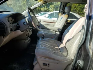 1999 Chrysler Town & Country LXi with VIN 1C4GP64L1XB599412, listed as a Copart auction lot 76901614 with Not Provided miles and Salvage Title. Bid and sale history available at carsss.com. Image 7.