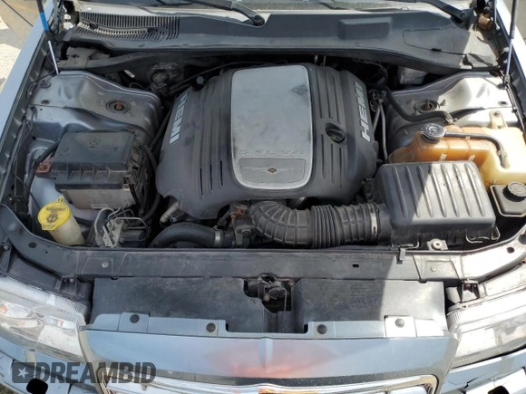 2007 Chrysler 300 C z VIN 2C3KA63H57H725971, wystawiony jako Copart lot #51793044 z przebiegiem 137 825 mil mil oraz Szkoda całkowita • Salvage title. Historia ofert i sprzedaży dostępna na DreamBid. Obrazek 11.