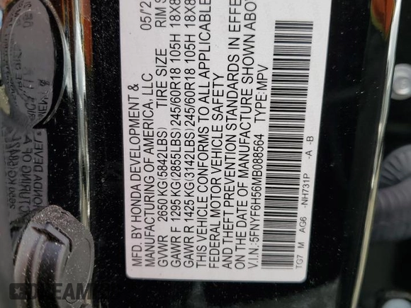 2021 Honda Pilot EX-L with VIN 5FNYF6H56MB088564, listed as a Copart auction lot 53860945 with 41,531 mi miles and Salvage title. Bid and sale history available at DreamBid. Image 13.