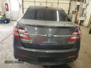 2017 Ford Taurus Limited z VIN 1FAHP2F81HG111818, wystawiony jako Copart lot #50169665 z przebiegiem 122 018 mil mil oraz Szkoda całkowita • Salvage title. Historia ofert i sprzedaży dostępna na DreamBid. Obrazek 6.