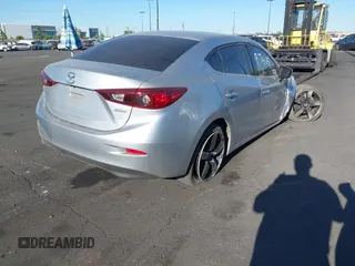 2017 Mazda 3 Touring with VIN JM1BN1V72H1106185, listed as a IAAI auction lot 42697405 with 110,324 mi miles and . Bid and sale history available at DreamBid. Image 4.
