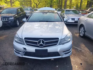 2015 Mercedes-Benz C with VIN WDDGJ4HB1FG372798, listed as a IAAI auction lot 41968536 with 56,007 mi miles. Bid and sale history available at carsss.com. Image 12.