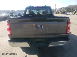 2023 Ford F-150 XL with VIN 1FTEW1CB1PKG04498, listed as a Copart auction lot 43714565 with 21,842 mi miles and Salvage Title. Bid and sale history available at carsss.com. Image 6.