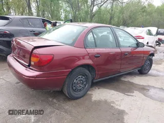 2001 Saturn SL z VIN 1G8ZH528X1Z355295, wystawiony jako IAAI lot #42057484 z przebiegiem 202 555 mil mil oraz . Historia ofert i sprzedaży dostępna na DreamBid. Obrazek 4.