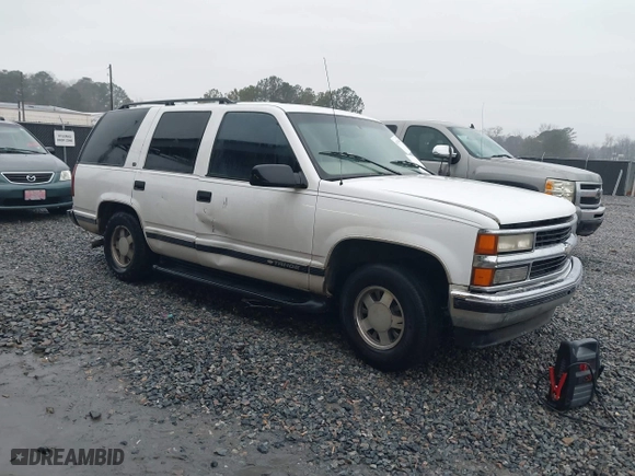 1999 Chevrolet Tahoe with VIN 1GNEC13RXXR101766, listed as a IAAI auction lot 41393447 with 387,448 mi miles. Bid and sale history available at carsss.com. Image 1.