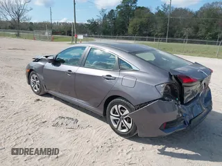 2017 Honda Civic LX with VIN 19XFC2F51HE036153, listed as a IAAI auction lot 41546498 with 78,726 mi miles and . Bid and sale history available at DreamBid. Image 3.