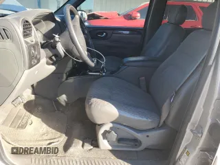 2004 GMC Envoy SLE with VIN 1GKET12S846184810, listed as a Copart auction lot 77475994 with Not Provided miles and Clean Title. Bid and sale history available at DreamBid. Image 7.