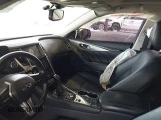 2019 Infiniti Q50 Luxe z VIN JN1EV7AR8KM594171, wystawiony jako IAAI lot #42428037 z przebiegiem 70 086 mil mil oraz . Historia ofert i sprzedaży dostępna na DreamBid. Obrazek 5.