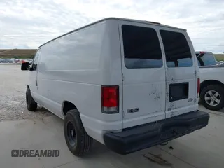 2001 Ford Econoline Cargo with VIN 1FTRE14261HA22632, listed as a IAAI auction lot 41202164 with 153,412 mi miles and . Bid and sale history available at DreamBid. Image 3.