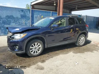 2014 Mazda CX-5 Touring with VIN JM3KE2CY7E0309051, listed as a Copart auction lot 54358625 with 27,664 mi miles and Salvage Title. Bid and sale history available at DreamBid. Image 1.