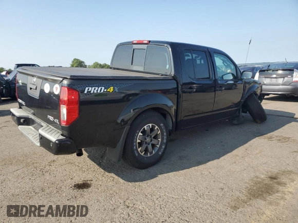 2017 Nissan Frontier Pro-4X with VIN 1N6AD0EV8HN753459, listed as a Copart auction lot 65873765 with 70,809 mi miles and Salvage title. Bid and sale history available at DreamBid. Image 3.