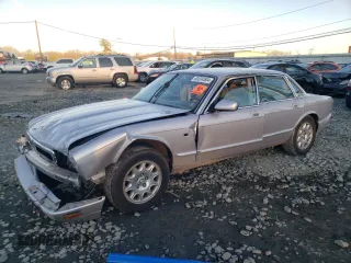 2002 Jaguar XJ 8 with VIN SAJDA14C12LF41461, listed as a Copart auction lot 83334504 with 52,268 mi miles and Salvage title. Bid and sale history available at DreamBid. Image 1.