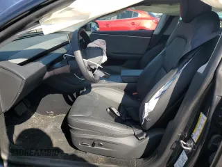 2024 Tesla Model 3 z VIN 5YJ3E1EA6RF731388, wystawiony jako Copart lot #50334065 z przebiegiem 8 305 mil mil oraz Szkoda całkowita • Salvage title. Historia ofert i sprzedaży dostępna na DreamBid. Obrazek 7.