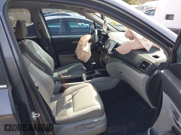 2017 Honda Pilot EX-L with VIN 5FNYF6H5XHB009029, listed as a IAAI auction lot 41883366 with 95,711 mi miles and . Bid and sale history available at DreamBid. Image 5.