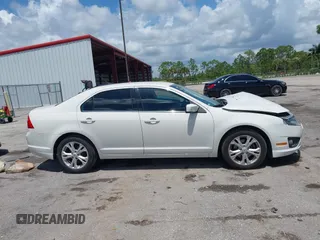 2012 Ford Fusion SE с VIN 3FAHP0HA4CR264831, выставлен на аукционе IAAI как лот 42519103 с пробегом 96 965 миль миль и . История ставок и продаж доступна на DreamBid. Изображение 13.
