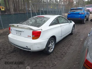 2000 Toyota Celica GTS with VIN JTDDY32T7Y0017943, listed as a IAAI auction lot 41684674 with 176,098 mi miles. Bid and sale history available at carsss.com. Image 4.