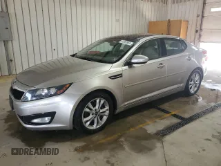 2011 Kia Optima EX z VIN KNAGN4A73B5168902, wystawiony jako Copart lot #59569365 z przebiegiem 160 297 mil mil oraz Szkoda całkowita • Salvage title. Historia ofert i sprzedaży dostępna na DreamBid. Obrazek 1.