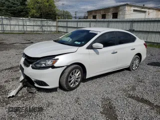 2018 Nissan Sentra SV z VIN 3N1AB7AP8JY249921, wystawiony jako Copart lot #55950335 z przebiegiem 57 560 mil mil oraz Szkoda całkowita • Salvage title. Historia ofert i sprzedaży dostępna na DreamBid. Obrazek 1.