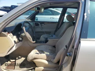 1997 Mercedes-Benz E-Class with VIN WDBJF72F2VA274233, listed as a Copart auction lot 74123554 with 80,914 mi miles and Salvage Title. Bid and sale history available at carsss.com. Image 7.