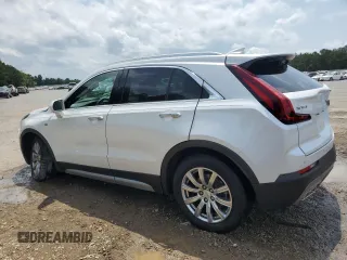 2019 Cadillac XT4 FWD Premium Luxury z VIN 1GYFZCR41KF127888, wystawiony jako Copart lot #55027135 z przebiegiem 111 057 mil mil oraz Szkody całkowita. Historia ofert i sprzedaży dostępna na DreamBid. Obrazek 2.