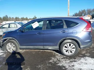 2014 Honda CR-V EX-L with VIN 2HKRM4H75EH613360, listed as a IAAI auction lot 41464112 with 100,797 mi miles. Bid and sale history available at carsss.com. Image 14.
