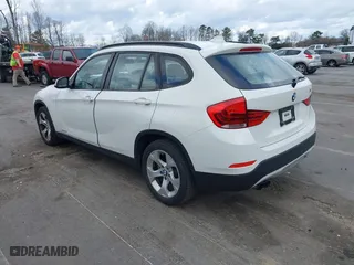 2015 BMW X1 sDrive28i with VIN WBAVM1C50FV314957, listed as a IAAI auction lot 41816402 with 148,410 mi miles. Bid and sale history available at carsss.com. Image 3.