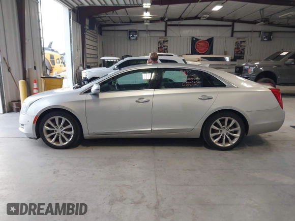2016 Cadillac XTS Luxury Collection with VIN 2G61M5S34G9189820, listed as a IAAI auction lot 42660069 with 72,489 mi miles and . Bid and sale history available at DreamBid. Image 14.