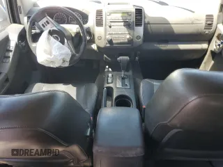 2010 Nissan Xterra S with VIN 5N1AN0NU2AC519838, listed as a Copart auction lot 57301355 with 129,990 mi miles and Salvage title. Bid and sale history available at DreamBid. Image 8.
