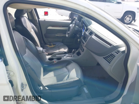 2008 Chrysler Sebring with VIN 1C3LC66J68N284521, listed as a IAAI auction lot 41508199 with 217,216 mi miles and . Bid and sale history available at DreamBid. Image 5.