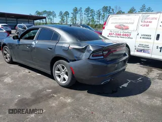 2019 Dodge Charger SXT with VIN 2C3CDXBG3KH748314, listed as a IAAI auction lot 41817204 with 93,266 mi miles. Bid and sale history available at carsss.com. Image 3.