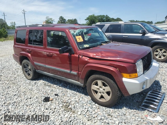 2007 Jeep Commander Sport with VIN 1J8HG48K07C684965, listed as a Copart auction lot 58061005 with 208,951 mi miles and Salvage title. Bid and sale history available at DreamBid. Image 4.