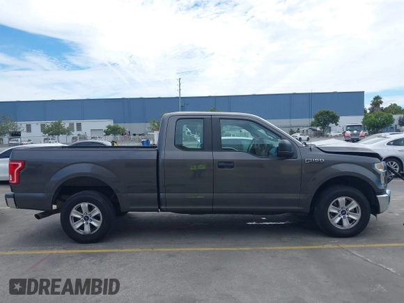 2015 Ford F-150 XL with VIN 1FTEX1CF7FKE65881, listed as a IAAI auction lot 42809438 with 122,541 mi miles and . Bid and sale history available at DreamBid. Image 13.