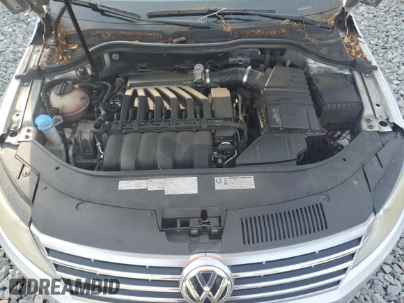 2013 Volkswagen CC Lux z VIN WVWHU7AN3DE500737, wystawiony jako Copart lot #56109175 z przebiegiem 135 579 mil mil oraz Tytuł czysty. Historia ofert i sprzedaży dostępna na DreamBid. Obrazek 11.