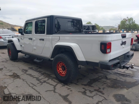 2021 Jeep Gladiator Willys with VIN 1C6HJTAG1ML572638, listed as a IAAI auction lot 42065562 with 43,040 mi miles and . Bid and sale history available at DreamBid. Image 3.