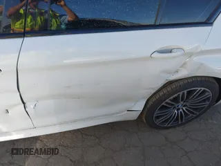 2019 BMW 5 Series 530e iPerformance with VIN WBAJA9C55KB254885, listed as a IAAI auction lot 41398164 with 62,781 mi miles. Bid and sale history available at carsss.com. Image 6.