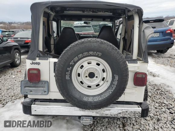 1999 Jeep Wrangler SE with VIN 1J4FY29P6XP452304, listed as a Copart auction lot 86702024 with 141,896 mi miles and Salvage Title. Bid and sale history available at carsss.com. Image 6.