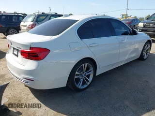 2017 BMW 3 Series 330i with VIN WBA8B9C55HK675882, listed as a IAAI auction lot 42004613 with 94,359 mi miles and . Bid and sale history available at DreamBid. Image 4.