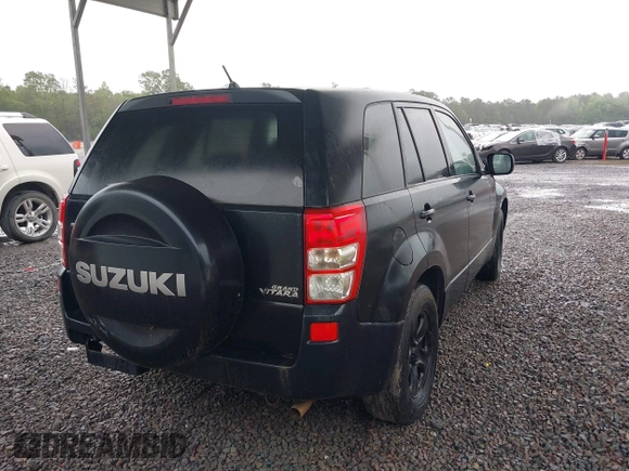 2010 Suzuki Grand Vitara Premium z VIN JS3TE0D25A4100407, wystawiony jako IAAI lot #42249747 z przebiegiem 138 781 mil mil oraz . Historia ofert i sprzedaży dostępna na DreamBid. Obrazek 4.