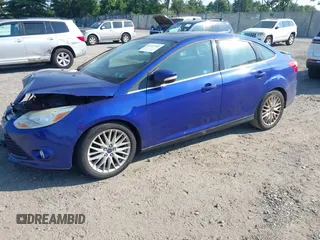 2014 Ford Focus Titanium with VIN 1FADP3J26EL179266, listed as a IAAI auction lot 42712701 with 157,897 mi miles and . Bid and sale history available at DreamBid. Image 2.