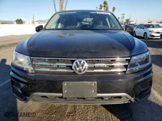 2021 Volkswagen Tiguan S with VIN 3VV1B7AX7MM015070, listed as a Copart auction lot 88311255 with 58,325 mi miles and Salvage Title. Bid and sale history available at carsss.com. Image 5.
