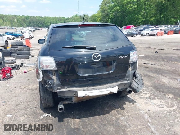 2010 Mazda CX-7 Touring z VIN JM3ER2W30A0341657, wystawiony jako IAAI lot #42123453 z przebiegiem 173 135 mil mil oraz . Historia ofert i sprzedaży dostępna na DreamBid. Obrazek 6.