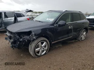 2013 Volkswagen Touareg Lux with VIN WVGEF9BP0DD002814, listed as a Copart auction lot 83015434 with 143,320 mi miles and Salvage Title. Bid and sale history available at DreamBid. Image 1.