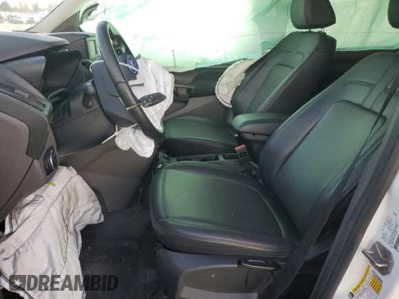 2022 Ford Transit Connect XL with VIN NM0GE9E23N1514695, listed as a Copart auction lot 82611814 with 84,124 mi miles and Salvage title. Bid and sale history available at DreamBid. Image 7.
